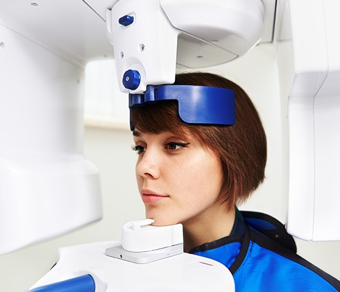Woman receiving advanced dentistry scans for guided dental implant placement