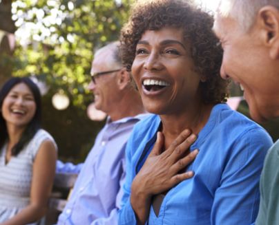 Smiling man in glasses with dental implants in Midlothian