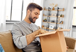 Man opening a package