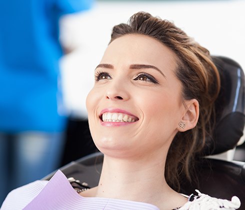 Woman smiling during preventive dentistry checkups and teeth cleanings