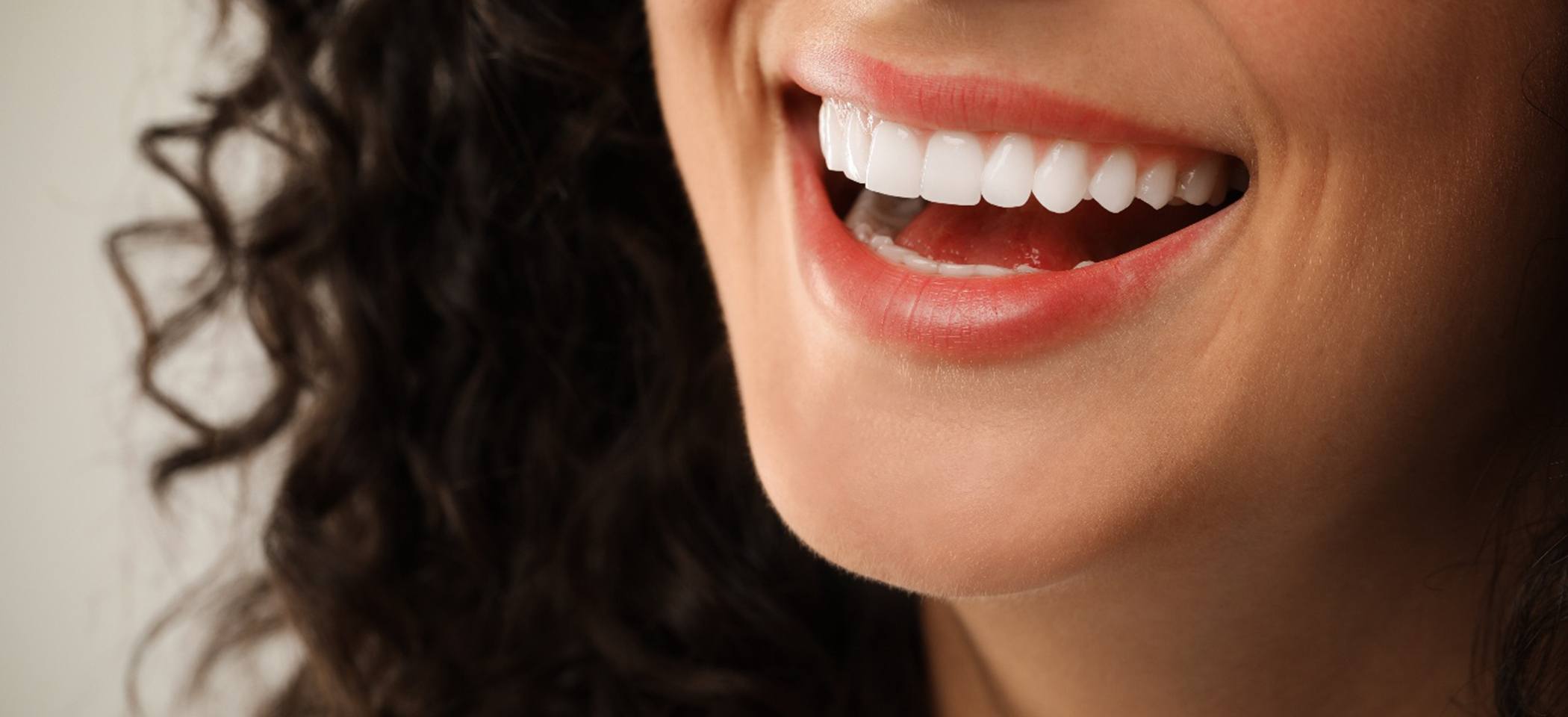 a close-up of a woman’s smile